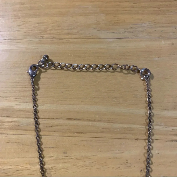 Avon goldtone heart shaped pendant necklace 20” length purple gem inside… - Picture 2 of 4